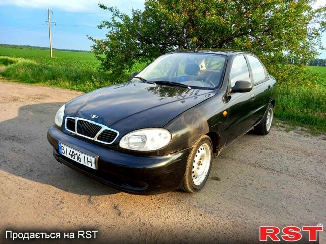 Черный Дэу Ланос, объемом двигателя 1.5 л и пробегом 368 тыс. км за 1150 $, фото 1 на Automoto.ua