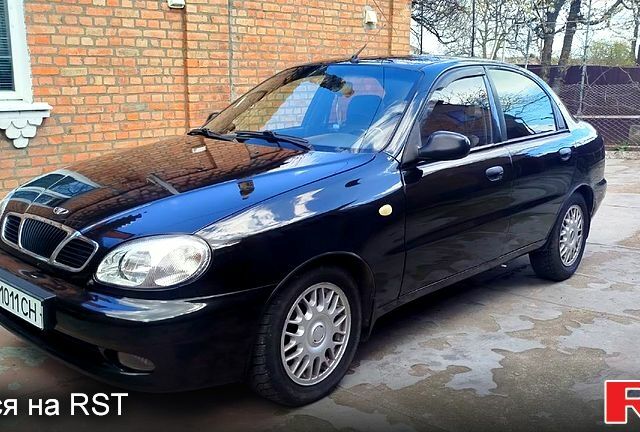 Черный Дэу Ланос, объемом двигателя 1.5 л и пробегом 300 тыс. км за 2700 $, фото 1 на Automoto.ua