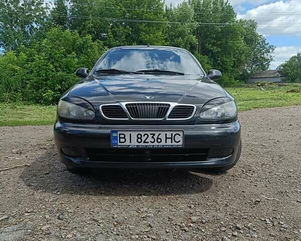 Черный Дэу Ланос, объемом двигателя 1.5 л и пробегом 164 тыс. км за 2250 $, фото 1 на Automoto.ua
