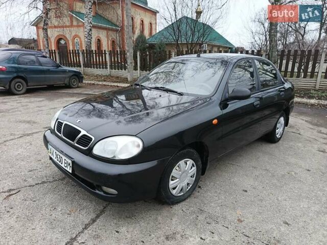Черный Дэу Ланос, объемом двигателя 1.5 л и пробегом 240 тыс. км за 1800 $, фото 1 на Automoto.ua