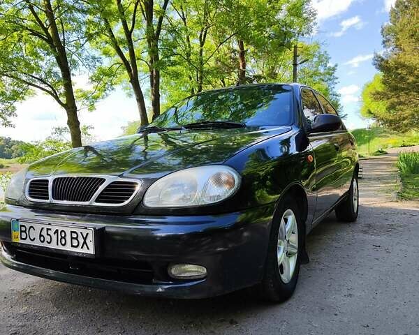 Черный Дэу Ланос, объемом двигателя 1.4 л и пробегом 165 тыс. км за 1450 $, фото 1 на Automoto.ua