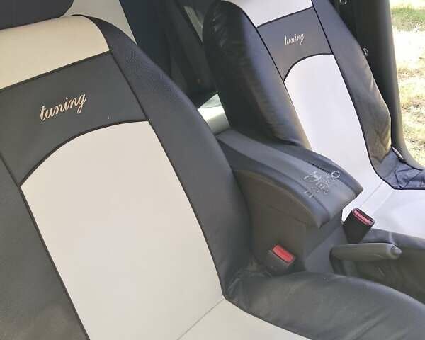 Черный Дэу Ланос, объемом двигателя 1.5 л и пробегом 350 тыс. км за 2500 $, фото 1 на Automoto.ua