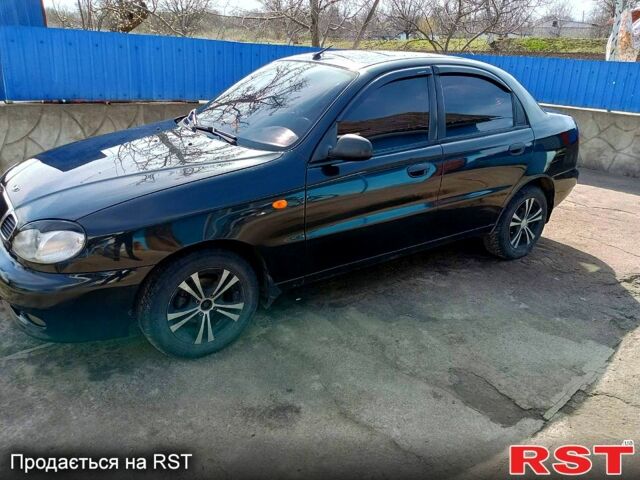 Черный Дэу Ланос, объемом двигателя 1.5 л и пробегом 230 тыс. км за 3100 $, фото 1 на Automoto.ua