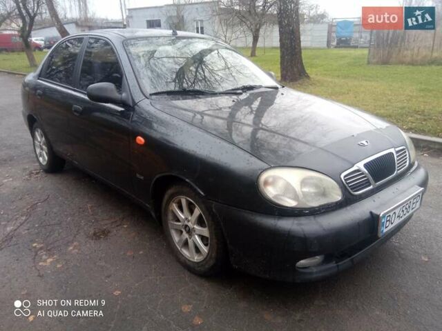 Чорний Деу Ланос, об'ємом двигуна 1.6 л та пробігом 230 тис. км за 1750 $, фото 1 на Automoto.ua