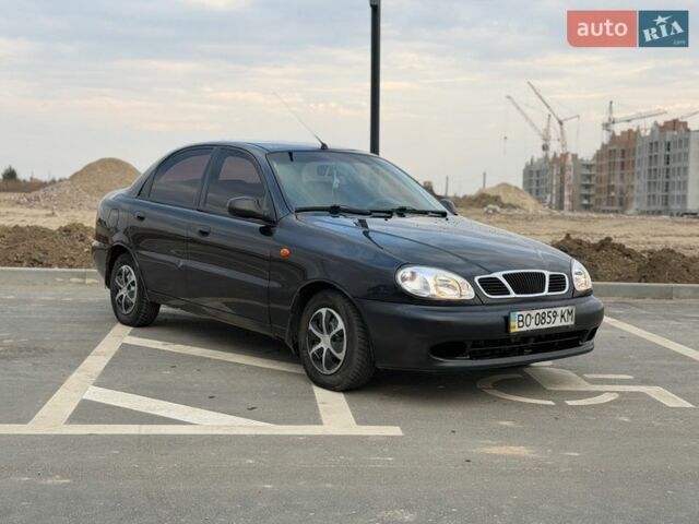 Чорний Деу Ланос, об'ємом двигуна 1.5 л та пробігом 157 тис. км за 1590 $, фото 1 на Automoto.ua