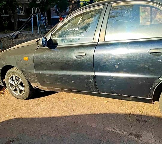 Черный Дэу Ланос, объемом двигателя 1.4 л и пробегом 0 тыс. км за 1300 $, фото 1 на Automoto.ua