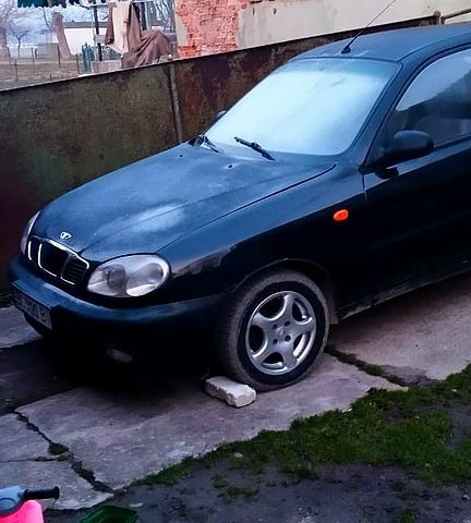 Чорний Деу Ланос, об'ємом двигуна 1.4 л та пробігом 0 тис. км за 1200 $, фото 1 на Automoto.ua