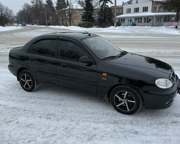 Черный Дэу Ланос, объемом двигателя 1.6 л и пробегом 165 тыс. км за 2650 $, фото 1 на Automoto.ua