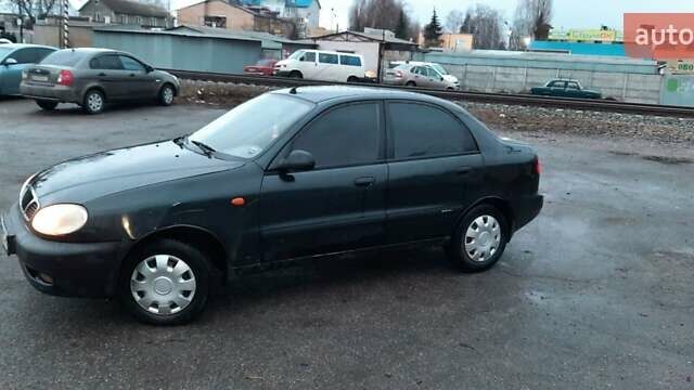 Чорний Деу Ланос, об'ємом двигуна 1.5 л та пробігом 450 тис. км за 1750 $, фото 1 на Automoto.ua