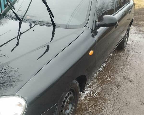 Чорний Деу Ланос, об'ємом двигуна 1.5 л та пробігом 220 тис. км за 2000 $, фото 1 на Automoto.ua
