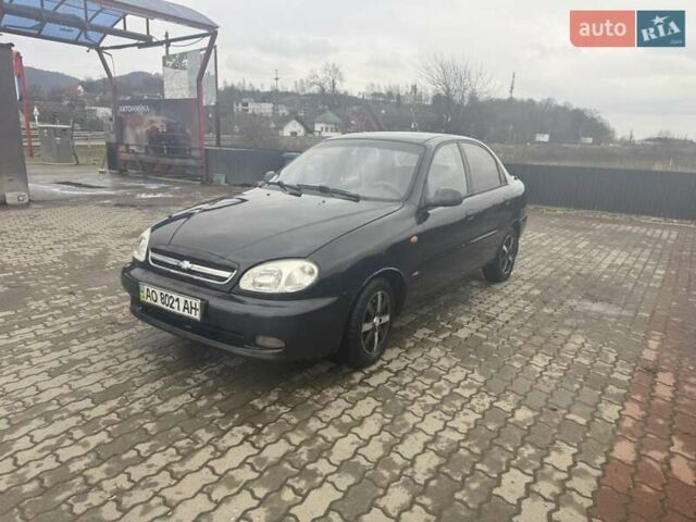 Черный Дэу Ланос, объемом двигателя 1.5 л и пробегом 300 тыс. км за 1700 $, фото 1 на Automoto.ua