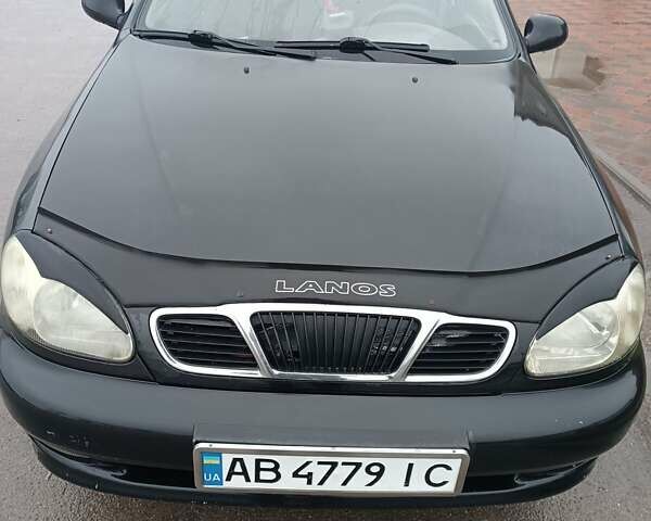 Черный Дэу Ланос, объемом двигателя 1.5 л и пробегом 300 тыс. км за 1800 $, фото 1 на Automoto.ua