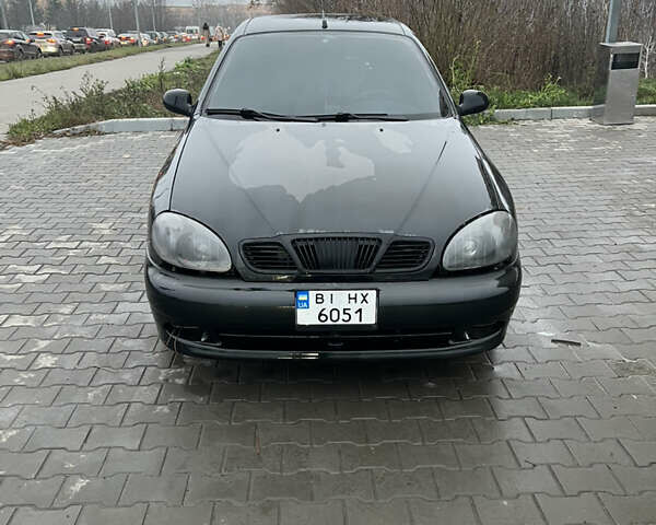 Черный Дэу Ланос, объемом двигателя 1.5 л и пробегом 161 тыс. км за 1950 $, фото 1 на Automoto.ua