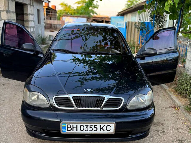 Черный Дэу Ланос, объемом двигателя 1.5 л и пробегом 192 тыс. км за 2700 $, фото 1 на Automoto.ua