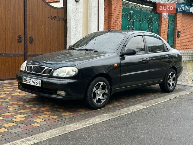 Чорний Деу Ланос, об'ємом двигуна 1.5 л та пробігом 210 тис. км за 2400 $, фото 1 на Automoto.ua