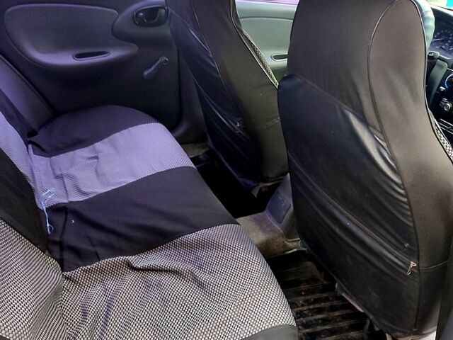 Черный Дэу Ланос, объемом двигателя 1.5 л и пробегом 137 тыс. км за 1900 $, фото 1 на Automoto.ua