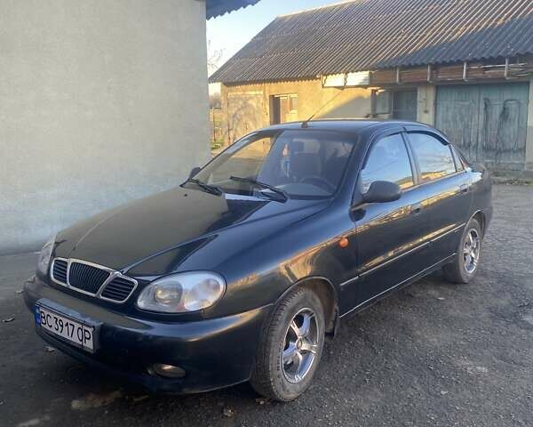 Черный Дэу Ланос, объемом двигателя 1.5 л и пробегом 204 тыс. км за 2350 $, фото 1 на Automoto.ua