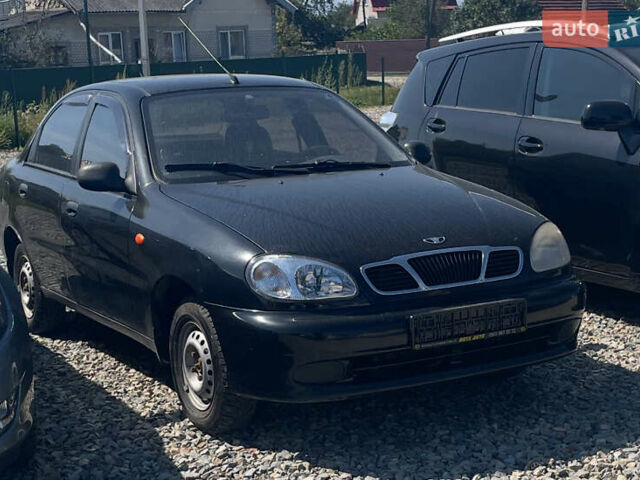 Чорний Деу Ланос, об'ємом двигуна 1.5 л та пробігом 157 тис. км за 1850 $, фото 1 на Automoto.ua