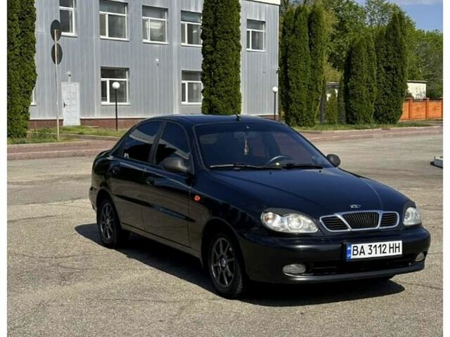 Черный Дэу Ланос, объемом двигателя 1.5 л и пробегом 255 тыс. км за 2800 $, фото 1 на Automoto.ua