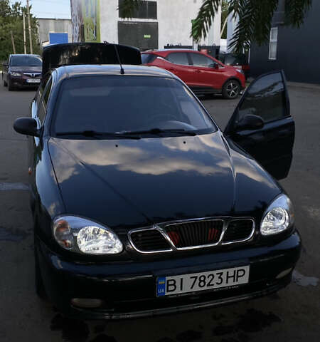 Черный Дэу Ланос, объемом двигателя 1.6 л и пробегом 320 тыс. км за 2500 $, фото 1 на Automoto.ua