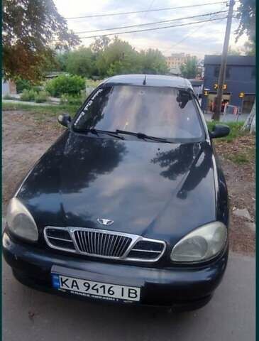 Черный Дэу Ланос, объемом двигателя 1.5 л и пробегом 247 тыс. км за 1600 $, фото 1 на Automoto.ua