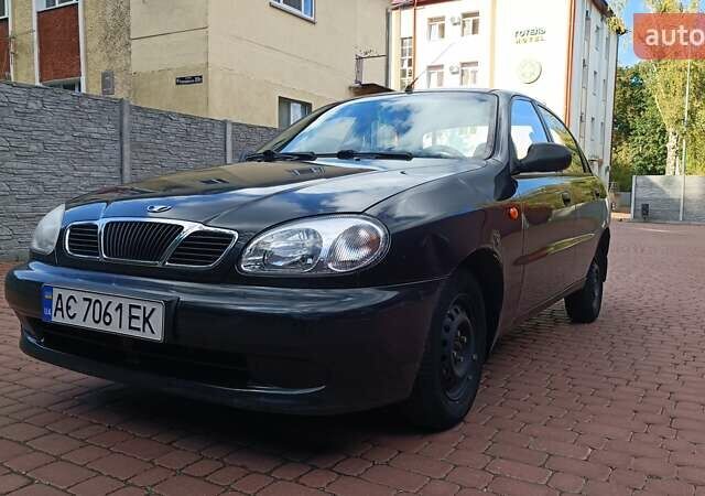 Черный Дэу Ланос, объемом двигателя 1.5 л и пробегом 158 тыс. км за 2300 $, фото 1 на Automoto.ua