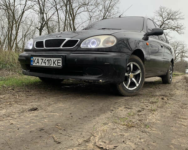 Черный Дэу Ланос, объемом двигателя 1.5 л и пробегом 119 тыс. км за 2590 $, фото 1 на Automoto.ua