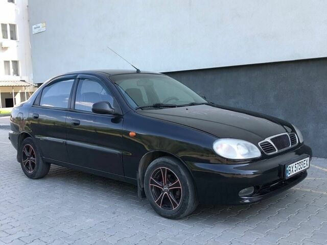 Чорний Деу Ланос, об'ємом двигуна 1.5 л та пробігом 259 тис. км за 2100 $, фото 1 на Automoto.ua