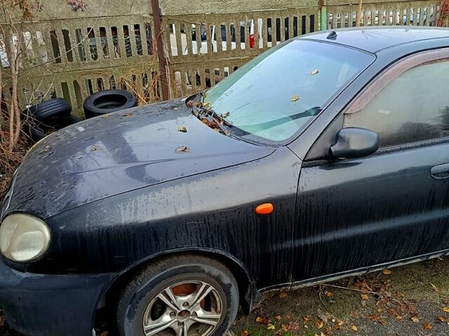 Черный Дэу Ланос, объемом двигателя 1.5 л и пробегом 160 тыс. км за 1700 $, фото 1 на Automoto.ua