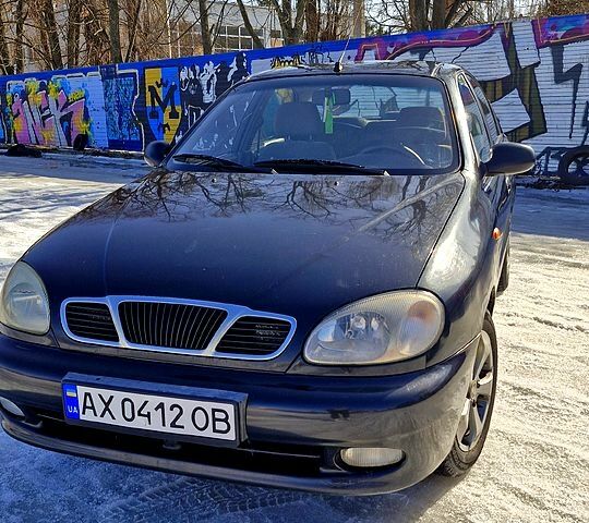 Чорний Деу Ланос, об'ємом двигуна 1.5 л та пробігом 294 тис. км за 1750 $, фото 1 на Automoto.ua