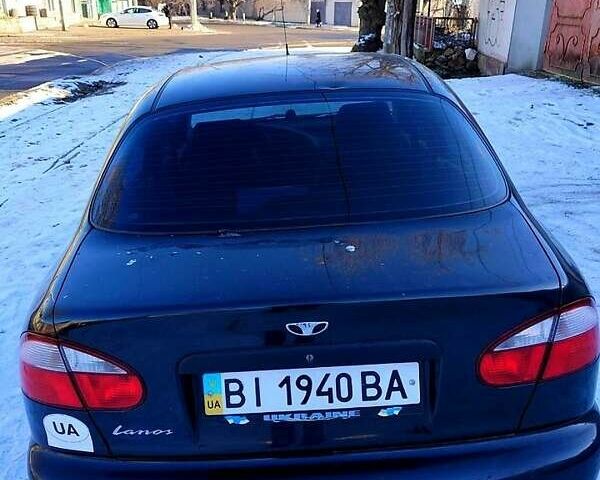 Чорний Деу Ланос, об'ємом двигуна 1.5 л та пробігом 148 тис. км за 2100 $, фото 1 на Automoto.ua