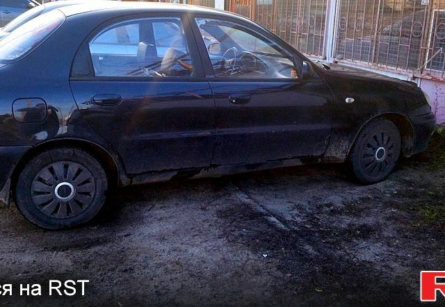 Черный Дэу Ланос, объемом двигателя 1.6 л и пробегом 269 тыс. км за 1300 $, фото 1 на Automoto.ua