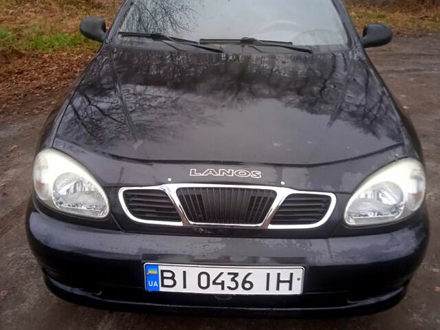 Чорний Деу Ланос, об'ємом двигуна 14 л та пробігом 250 тис. км за 1950 $, фото 1 на Automoto.ua