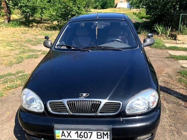 Черный Дэу Ланос, объемом двигателя 1.5 л и пробегом 140 тыс. км за 2000 $, фото 1 на Automoto.ua