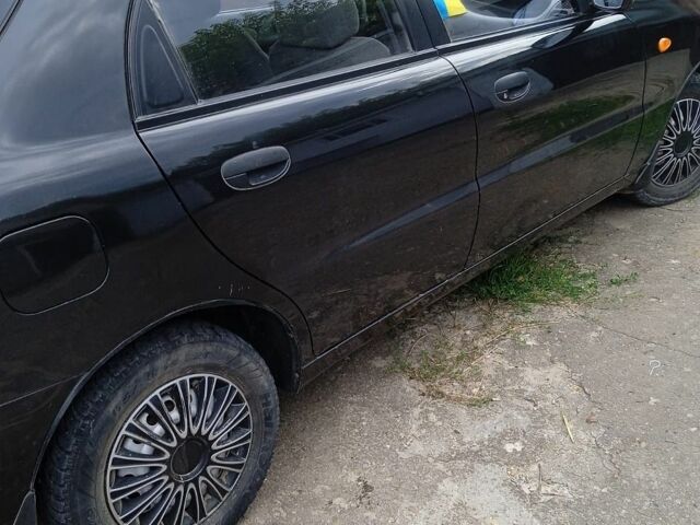Чорний Деу Ланос, об'ємом двигуна 1.5 л та пробігом 79 тис. км за 3500 $, фото 1 на Automoto.ua