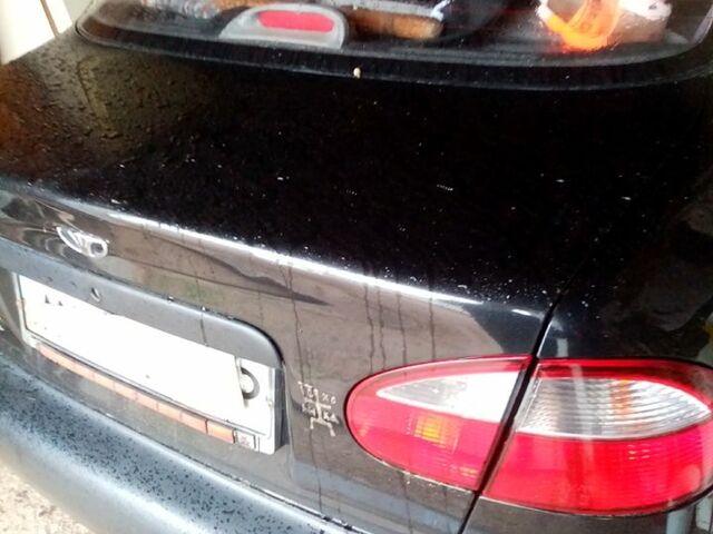 Чорний Деу Ланос, об'ємом двигуна 1.5 л та пробігом 170 тис. км за 2200 $, фото 1 на Automoto.ua