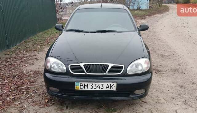 Чорний Деу Ланос, об'ємом двигуна 1.4 л та пробігом 180 тис. км за 1600 $, фото 1 на Automoto.ua