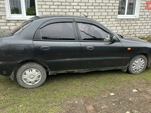 Черный Дэу Ланос, объемом двигателя 1.5 л и пробегом 179 тыс. км за 2200 $, фото 1 на Automoto.ua