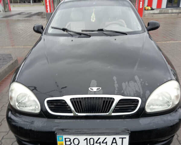 Черный Дэу Ланос, объемом двигателя 1.5 л и пробегом 159 тыс. км за 1900 $, фото 1 на Automoto.ua