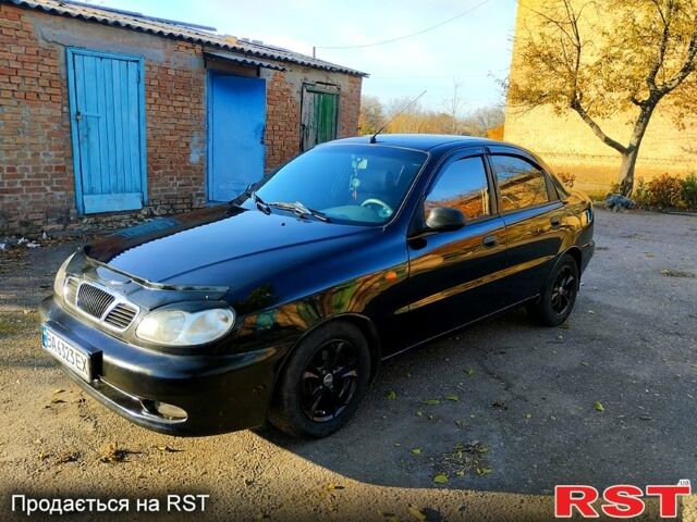 Чорний Деу Ланос, об'ємом двигуна 1.6 л та пробігом 238 тис. км за 2700 $, фото 1 на Automoto.ua