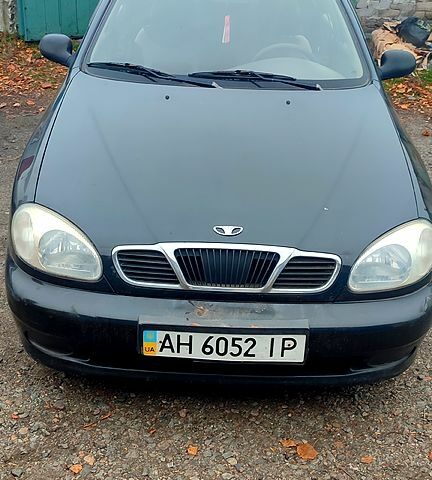 Черный Дэу Ланос, объемом двигателя 1.4 л и пробегом 222 тыс. км за 1400 $, фото 1 на Automoto.ua