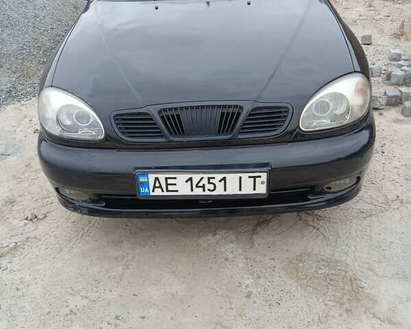 Черный Дэу Ланос, объемом двигателя 1.5 л и пробегом 250 тыс. км за 1700 $, фото 1 на Automoto.ua