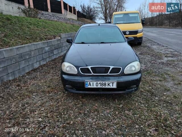 Чорний Деу Ланос, об'ємом двигуна 1.5 л та пробігом 200 тис. км за 1300 $, фото 1 на Automoto.ua