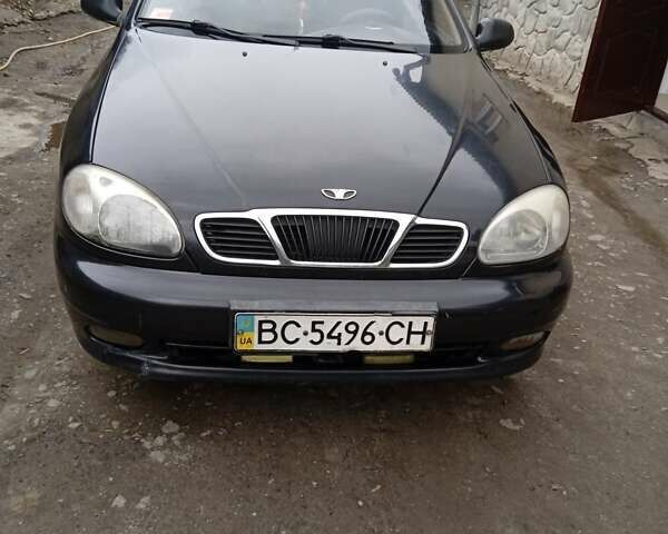Черный Дэу Ланос, объемом двигателя 1.5 л и пробегом 197 тыс. км за 2500 $, фото 1 на Automoto.ua