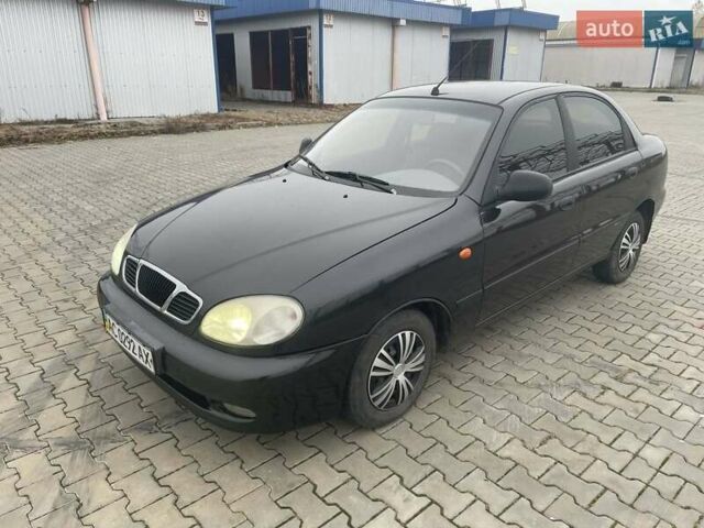 Черный Дэу Ланос, объемом двигателя 1.6 л и пробегом 170 тыс. км за 2400 $, фото 1 на Automoto.ua