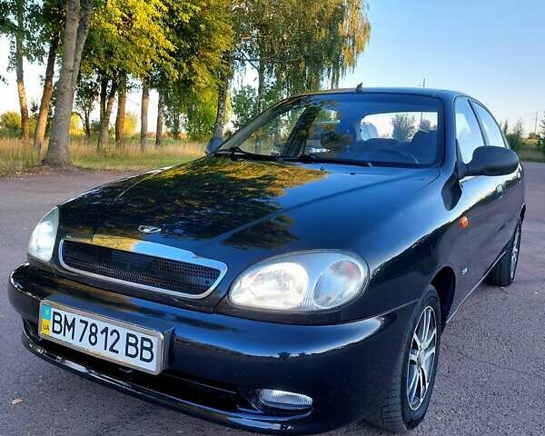 Чорний Деу Ланос, об'ємом двигуна 1.6 л та пробігом 174 тис. км за 2800 $, фото 1 на Automoto.ua