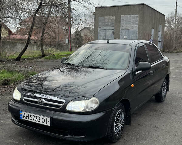 Черный Дэу Ланос, объемом двигателя 1.5 л и пробегом 270 тыс. км за 2550 $, фото 1 на Automoto.ua
