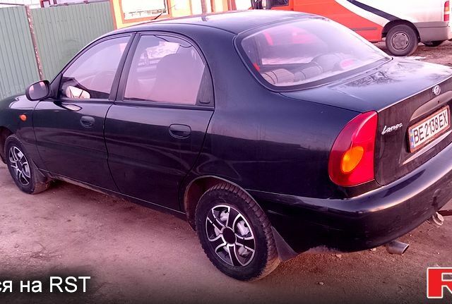 Черный Дэу Ланос, объемом двигателя 1.5 л и пробегом 164 тыс. км за 3500 $, фото 1 на Automoto.ua