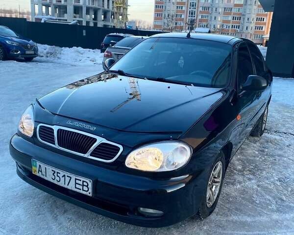 Чорний Деу Ланос, об'ємом двигуна 1.5 л та пробігом 233 тис. км за 2899 $, фото 1 на Automoto.ua