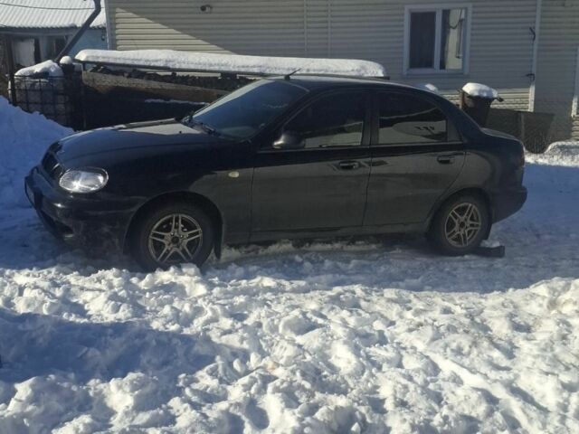 Черный Дэу Ланос, объемом двигателя 1.5 л и пробегом 300 тыс. км за 2000 $, фото 1 на Automoto.ua